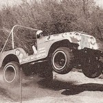 Random image: 154_0801_01_z+reader_rides_sideways+jeep_cj5