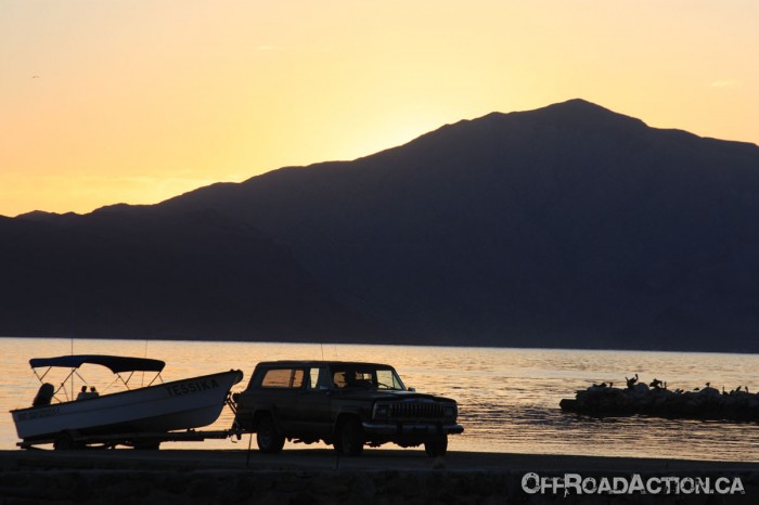 Jeep Cherokee during the sunrise at Bay of LA, Baja Mexico
