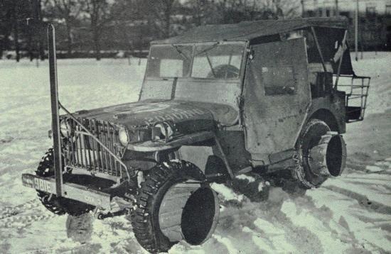 Early Willys MB with mud flotation adaptors